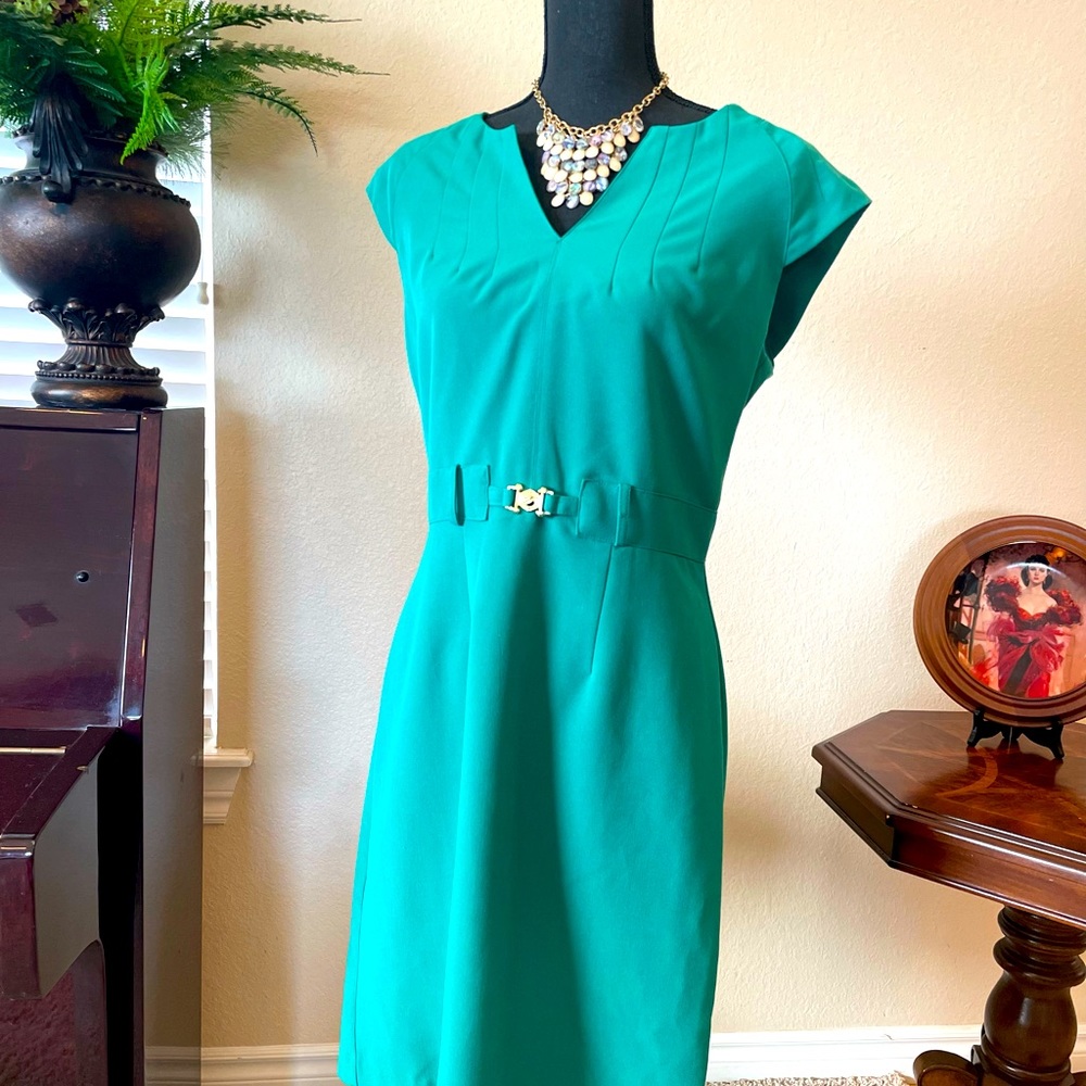Shelby & Palmer. Cute green dress. Size 8. Above the knee. Office/Night out.